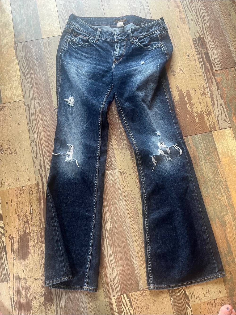 Silver Jeans Dark Blue Distressed Flare Jeans
